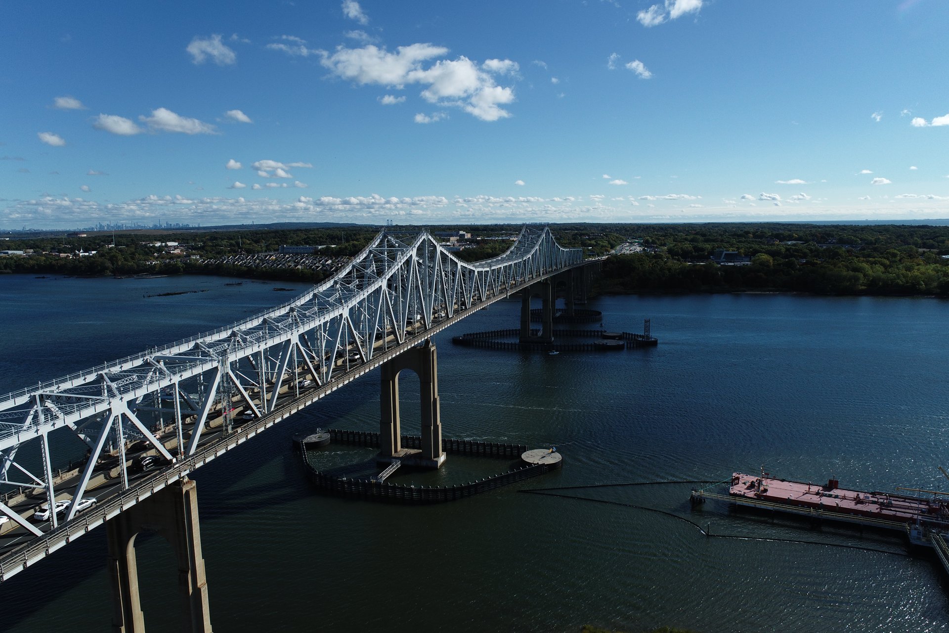 Aerial drone view of Outerbridge Crossing bridge over water, Staten Island NY